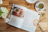Magazine en conscience avec infusion tisane, sujet racines et traditions avec champignons adaptogènes, moment détente