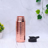 Bouteille d'eau en cuivre ayurvedique artisanale matrelée, avec bouchon de transport
